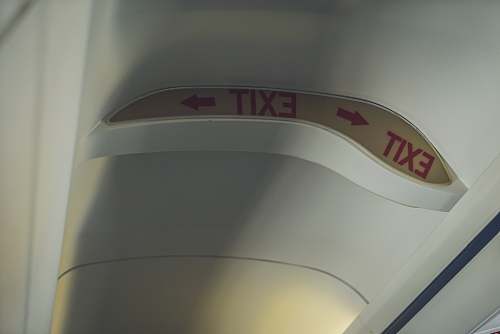 o'hare airport chicago Exit signage on ceiling chicago